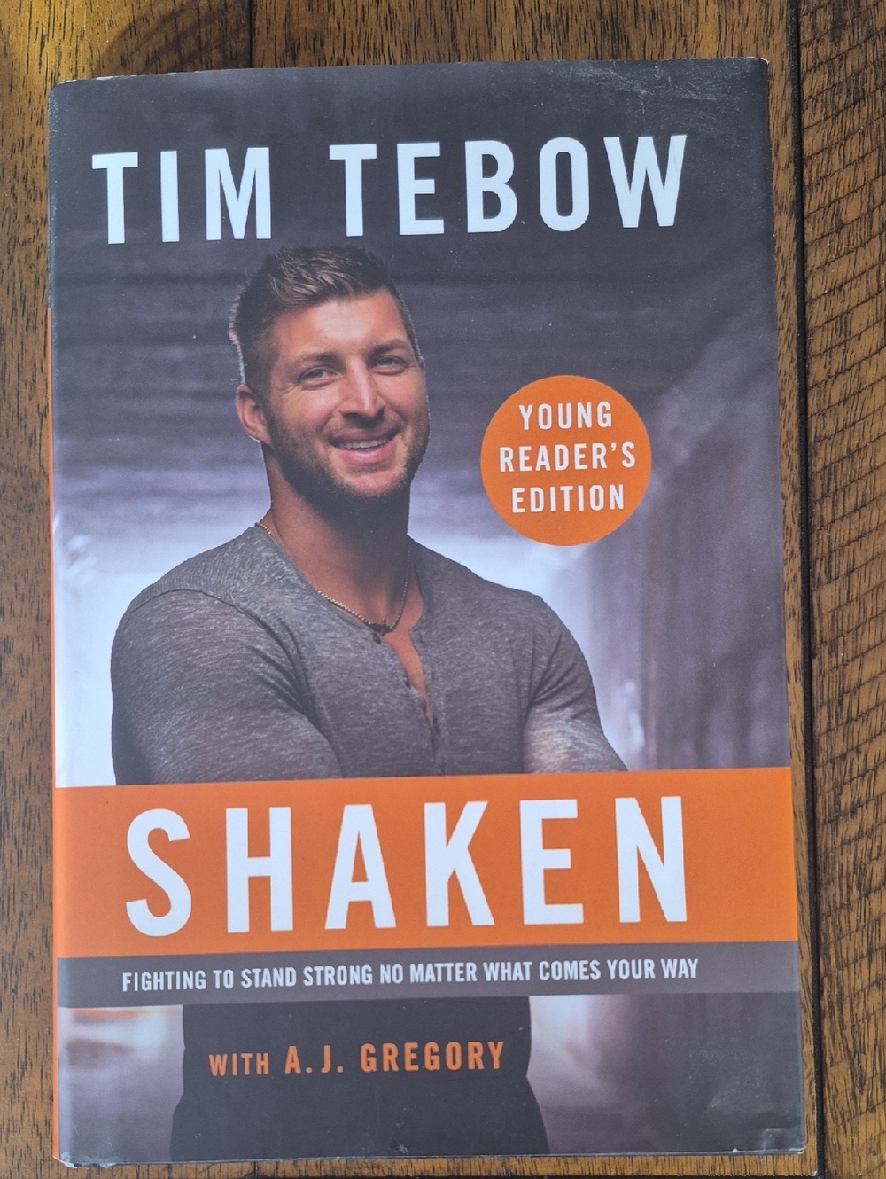 Tim Tebow "Shaken" Young Reader's Edition - Orange & Gray Cover